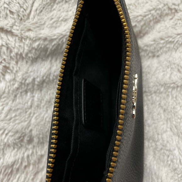 Coach zippered pouch with leather wristlet strap. Good used condition. Black. - Picture 4 of 4